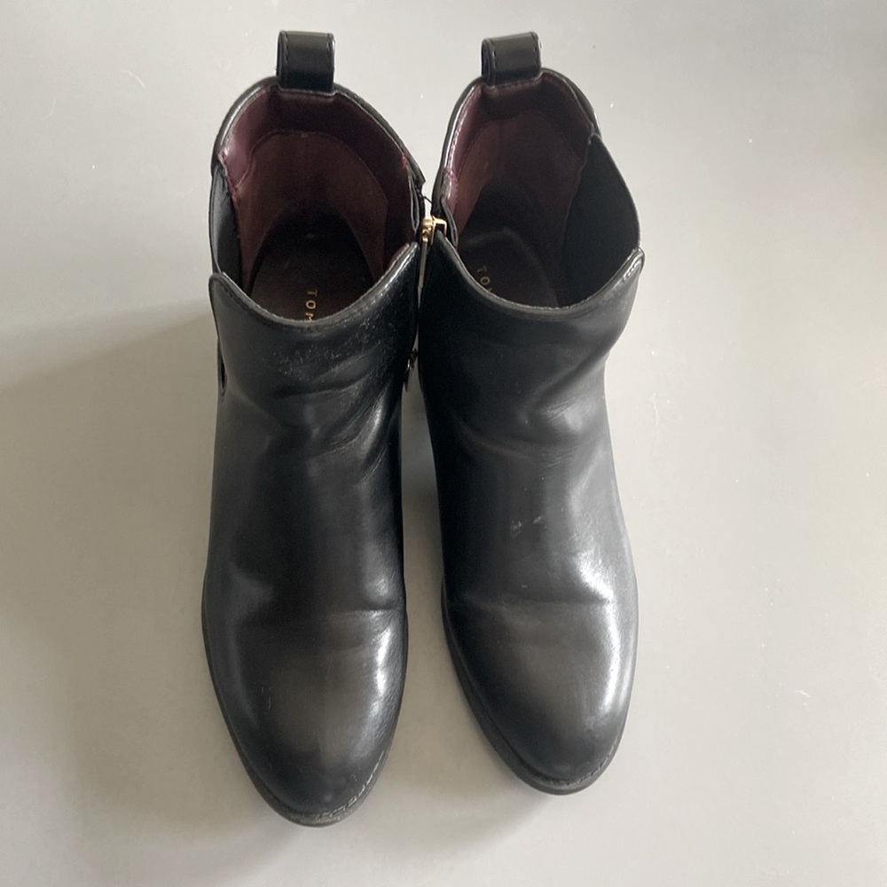 These are Tommy Hilfiger side zip half boots. Size 7.5 medium wide. Black
